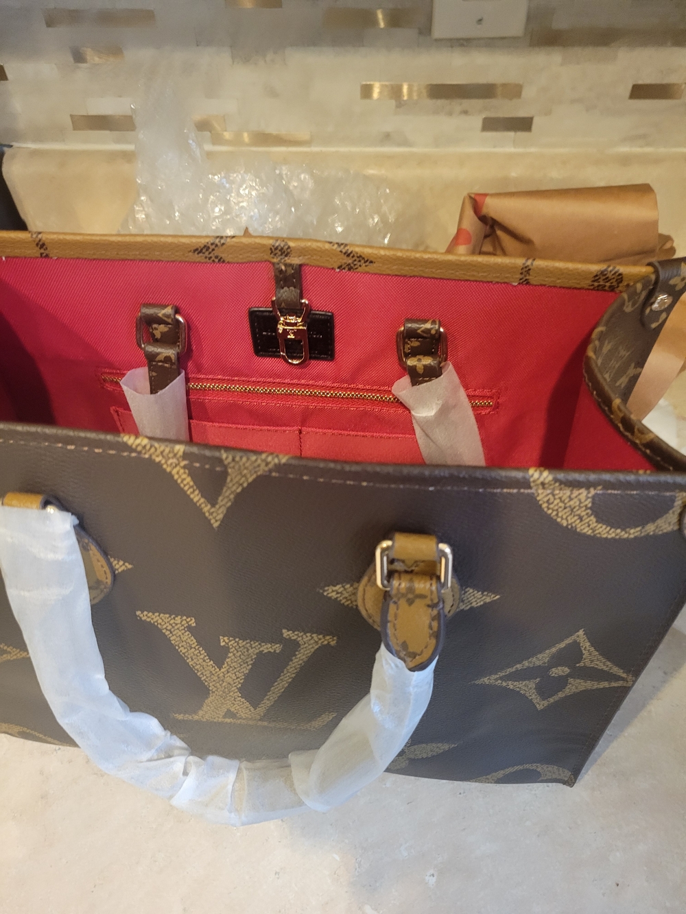 Monogram Canvas Tote Bag with Red Interior Comes With Dust Bag.